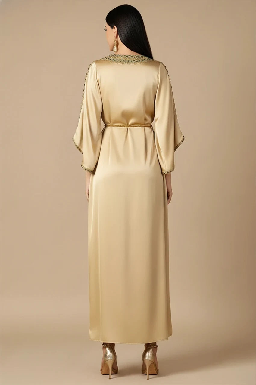 Back studio view of Almira champagne kaftan with kimono sleeves and braided belt