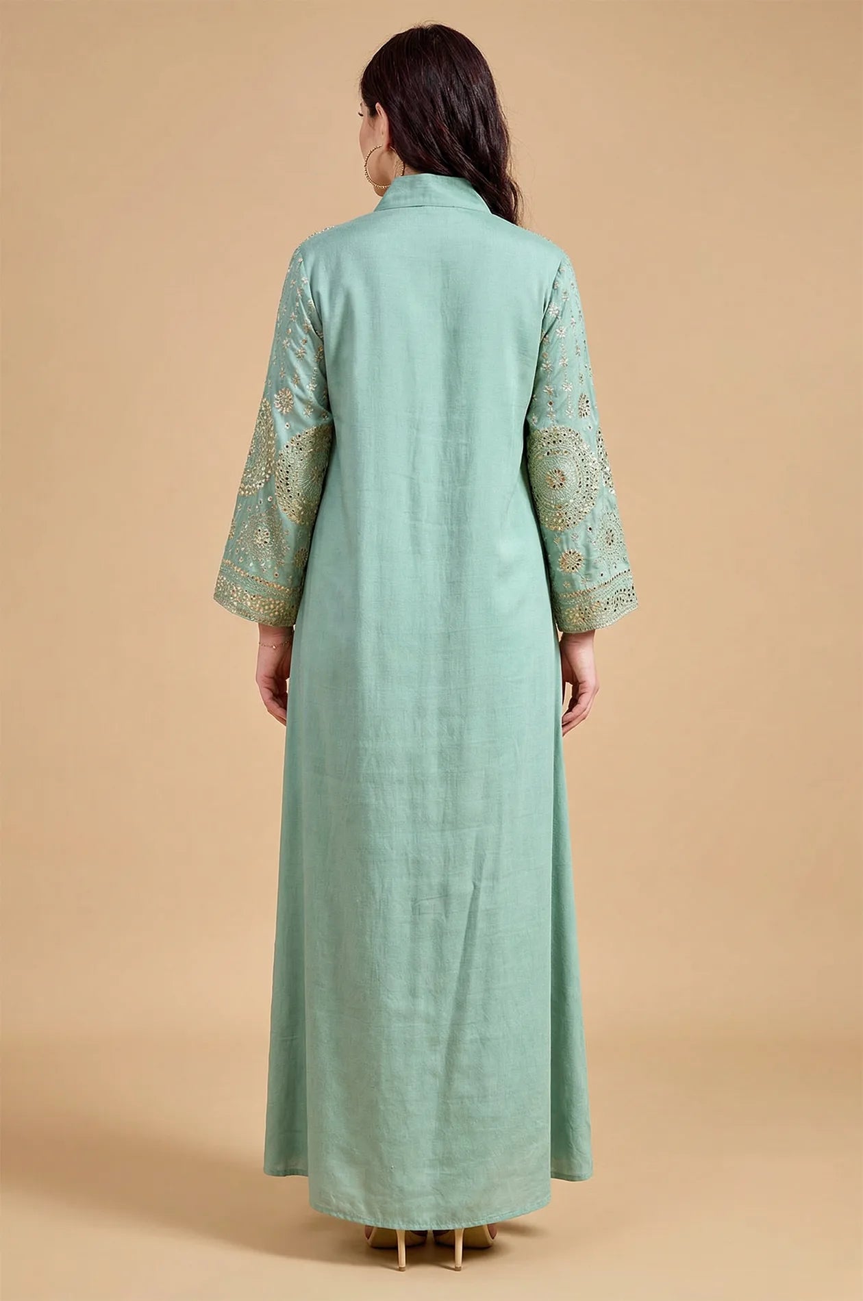 Full back view of the Aluna light green mirror kaftan on a model, showcasing the modest floor-length silhouette.