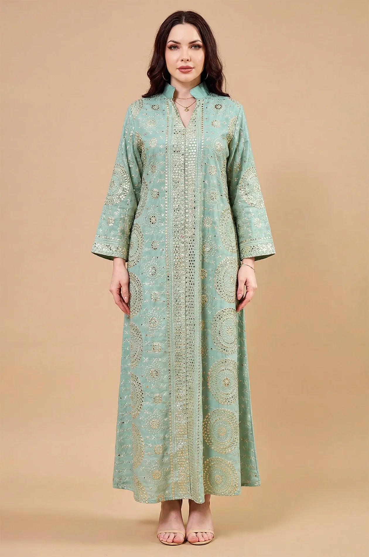 Studio front view of the Aluna light green mirror kaftan by Naylara with traditional geometric reflective patterns.