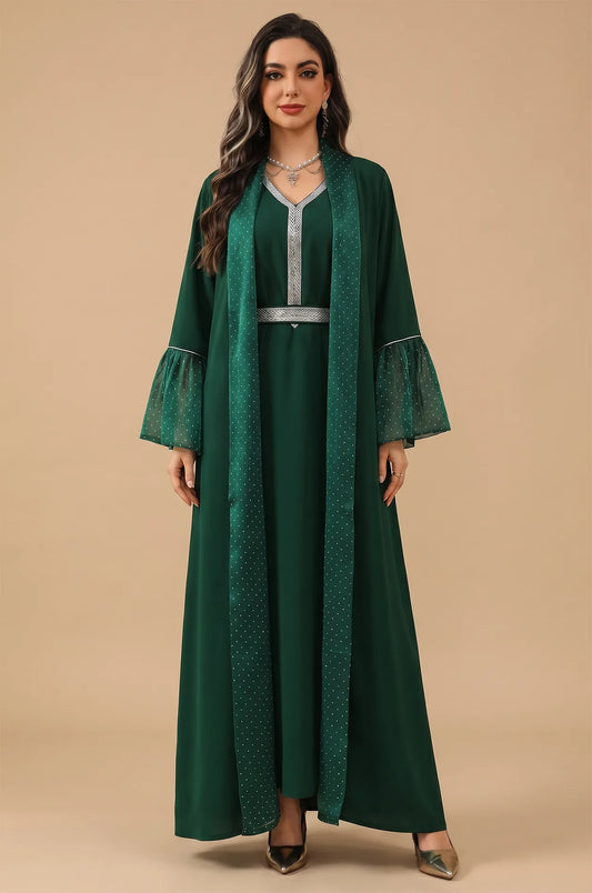 Front view of the Auris Green Kaftan set against a neutral background, highlighting the modest A-line silhouette and shimmer details.