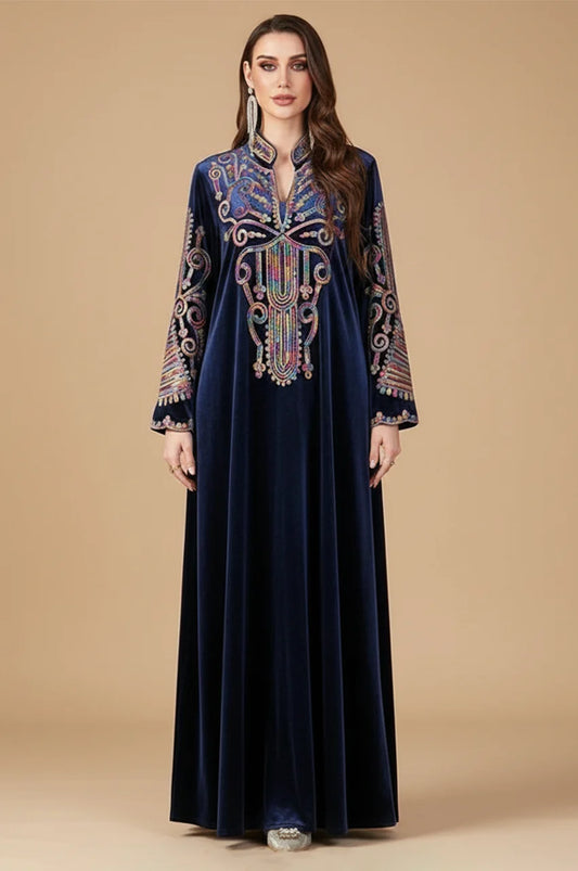 Front view of Avela Navy Blue velvet kaftan long dress featuring colorful chest embroidery.