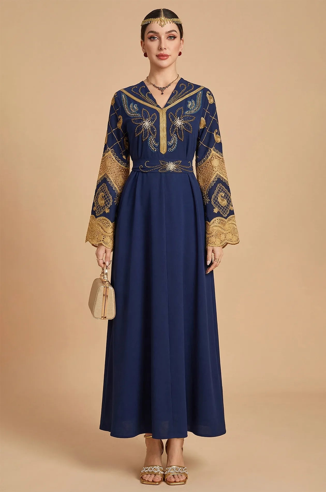 Full front view of the Aysel royal Moroccan kaftan in royal blue with gold beadwork.
