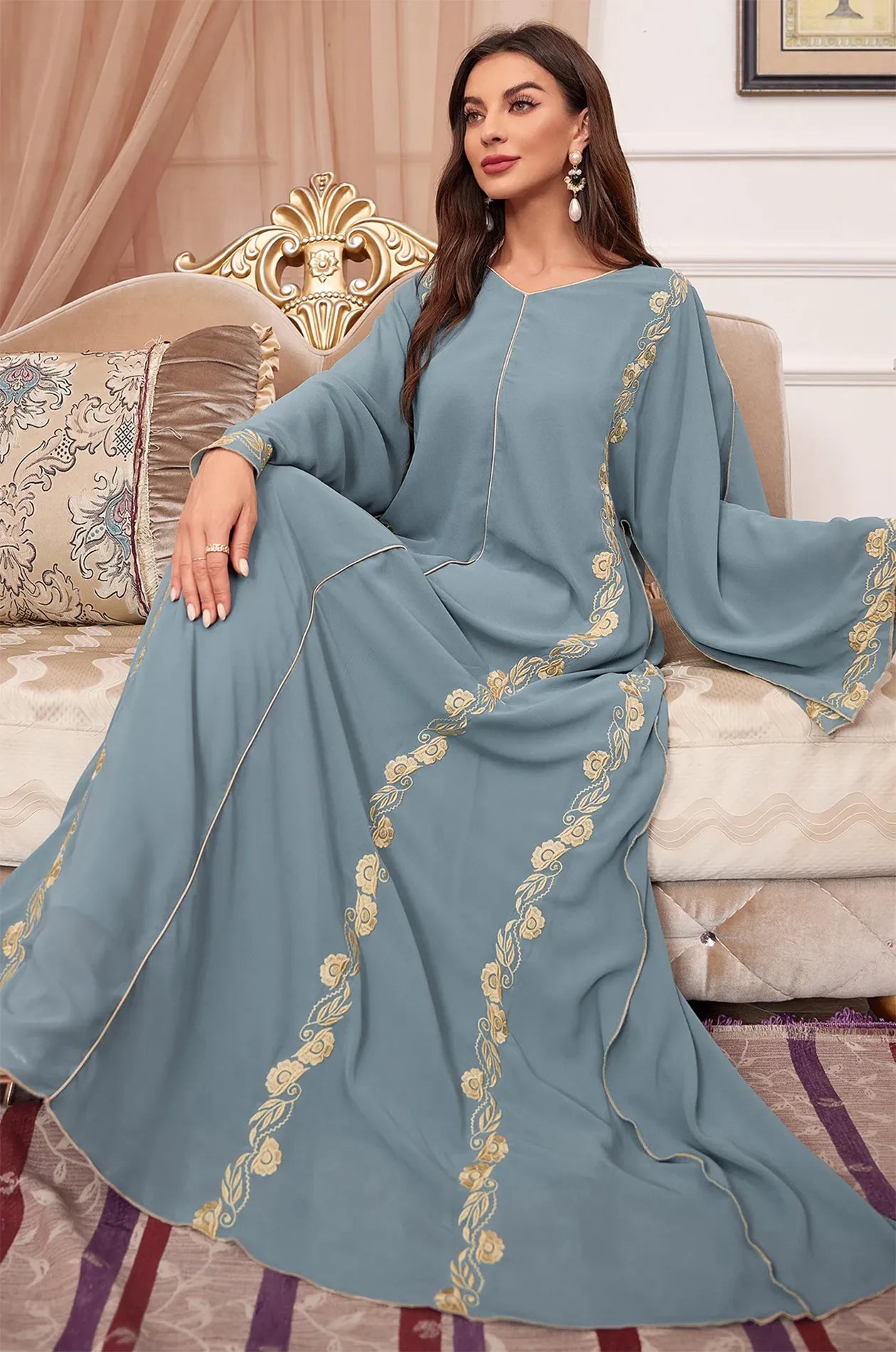 Close-up of the intricate gold embroidery on the Tahra model.