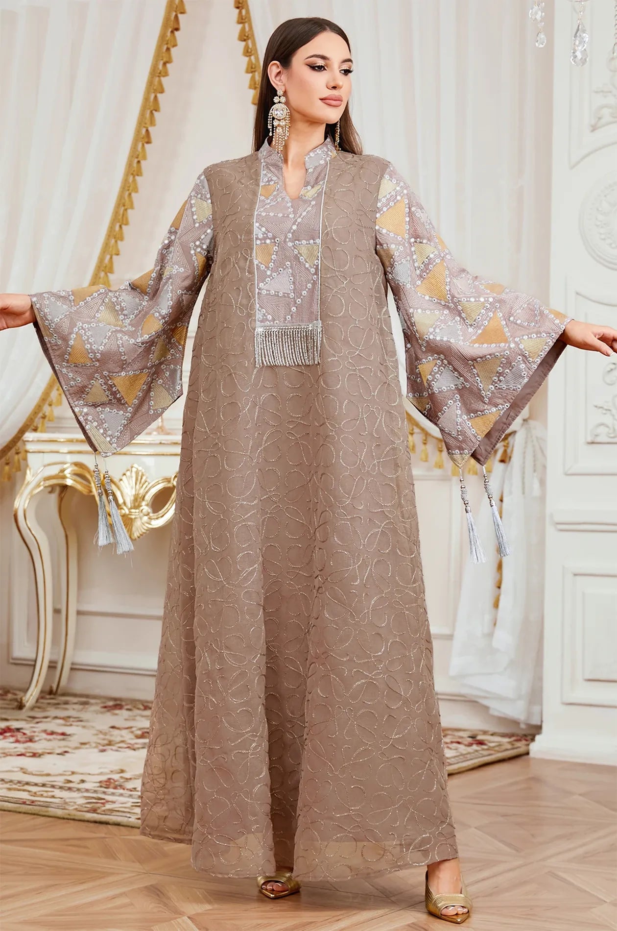 Full front view of the Brown Kaliera geometric kaftan by Naylara, showcasing the oversized bell sleeves and intricate triangular patterns.
