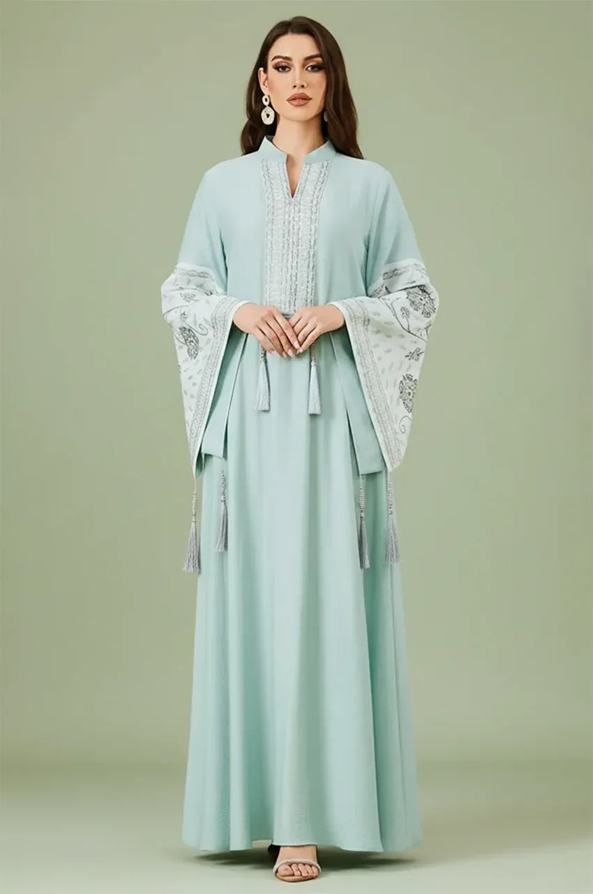 Professional studio front view of the Cyan Nairi cotton kaftan maxi with intricate white sfifa embroidery and bell sleeves.