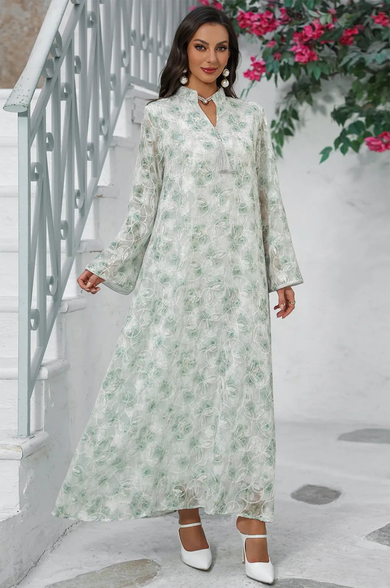 Full-body shot of the Lyana kaftan showcasing the intricate lace transparency.