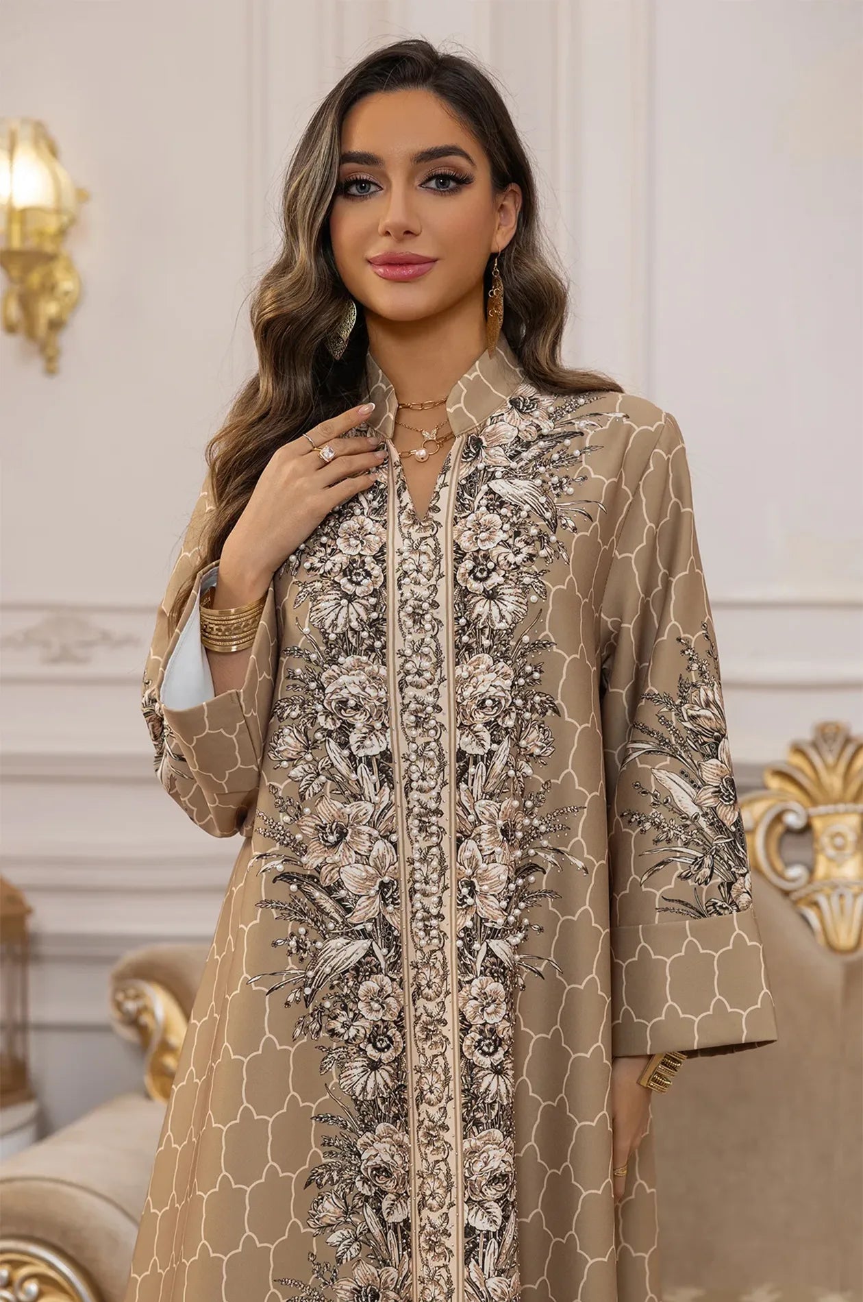 Close-up of the high-neck Mandarin collar and the champagne-toned floral embroidery on the Elora Beige kaftan.