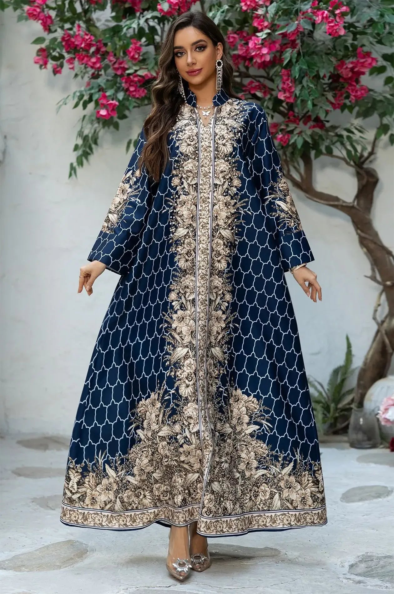 Wide-angle shot of the Elora Blue kaftan showing the intricate floral border at the hem and the fluid movement of the fabric.