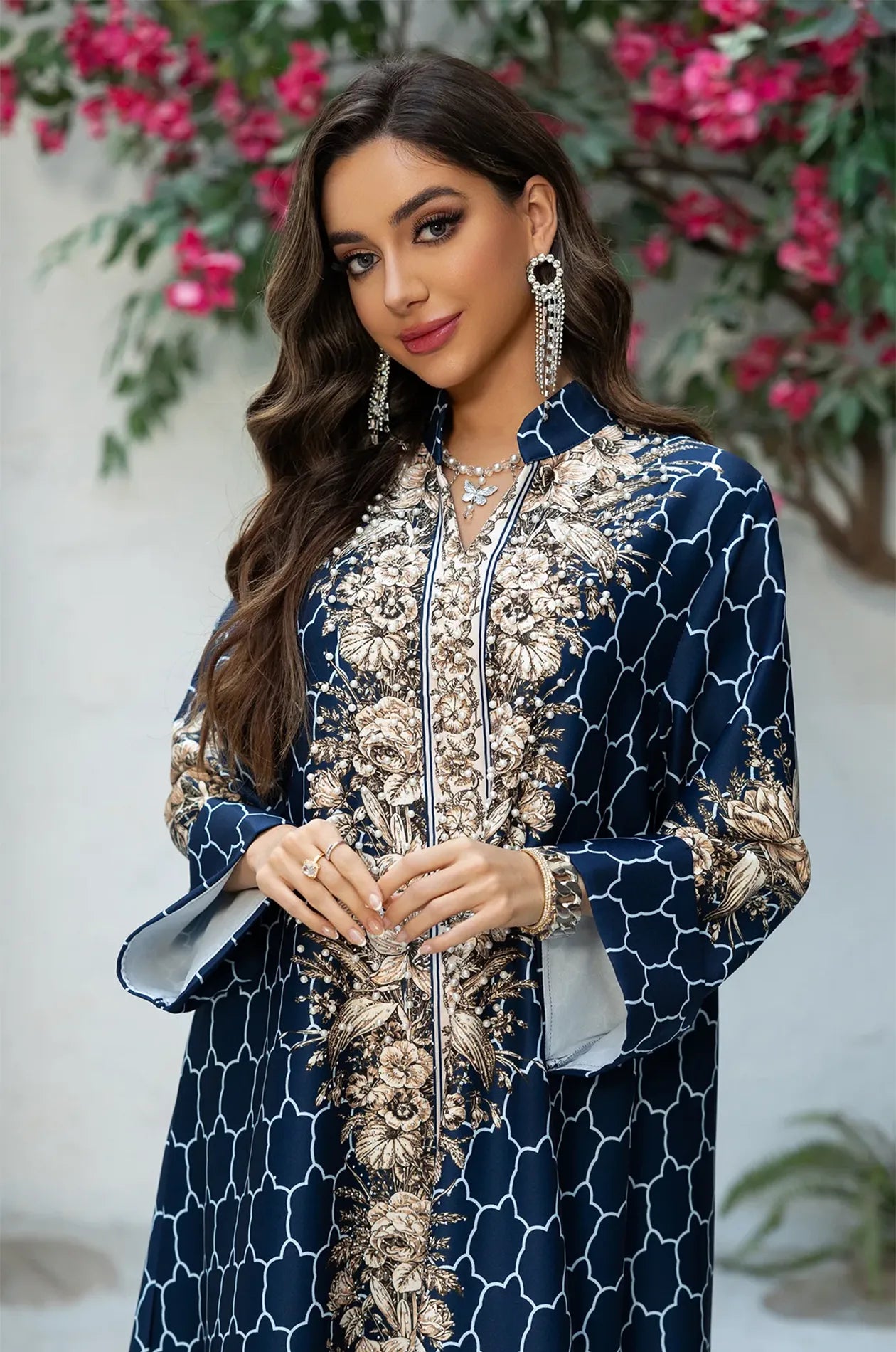 Medium shot of the Elora Blue kaftan showcasing the embellished bodice, silver-toned embroidery, and matching jewelry.
