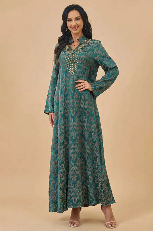 Full front view of the Farah emerald green jeweled kaftan dress with gold beading.