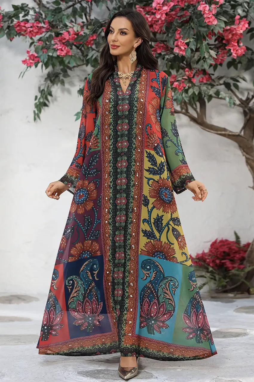 Model posing in the Fariya multicolor patchwork floral maxi kaftan dress.