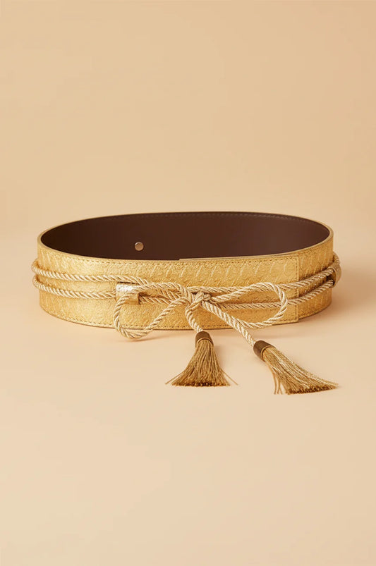 Flat lay view of gold metallic snake print waist belt with brown lining and rope ties.
