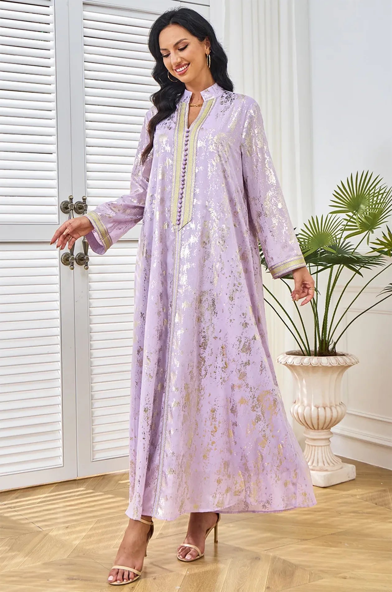 Demonstrating the airy movement of the lightweight Halim fabric.