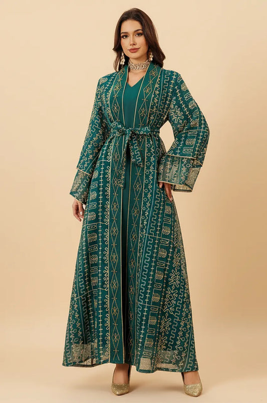 Front view of the ILYAH emerald green embroidered belted kaftan dress with sheer chiffon overlay.