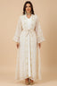 Professional studio shot of the ILYAH ivory white embroidered belted kaftan dress.