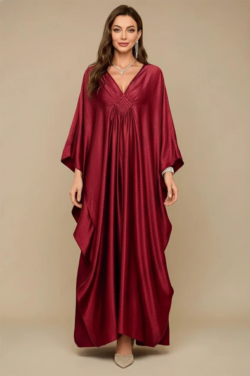Inara red batwing kaftan front view with V-neckline and elegant draped silhouette