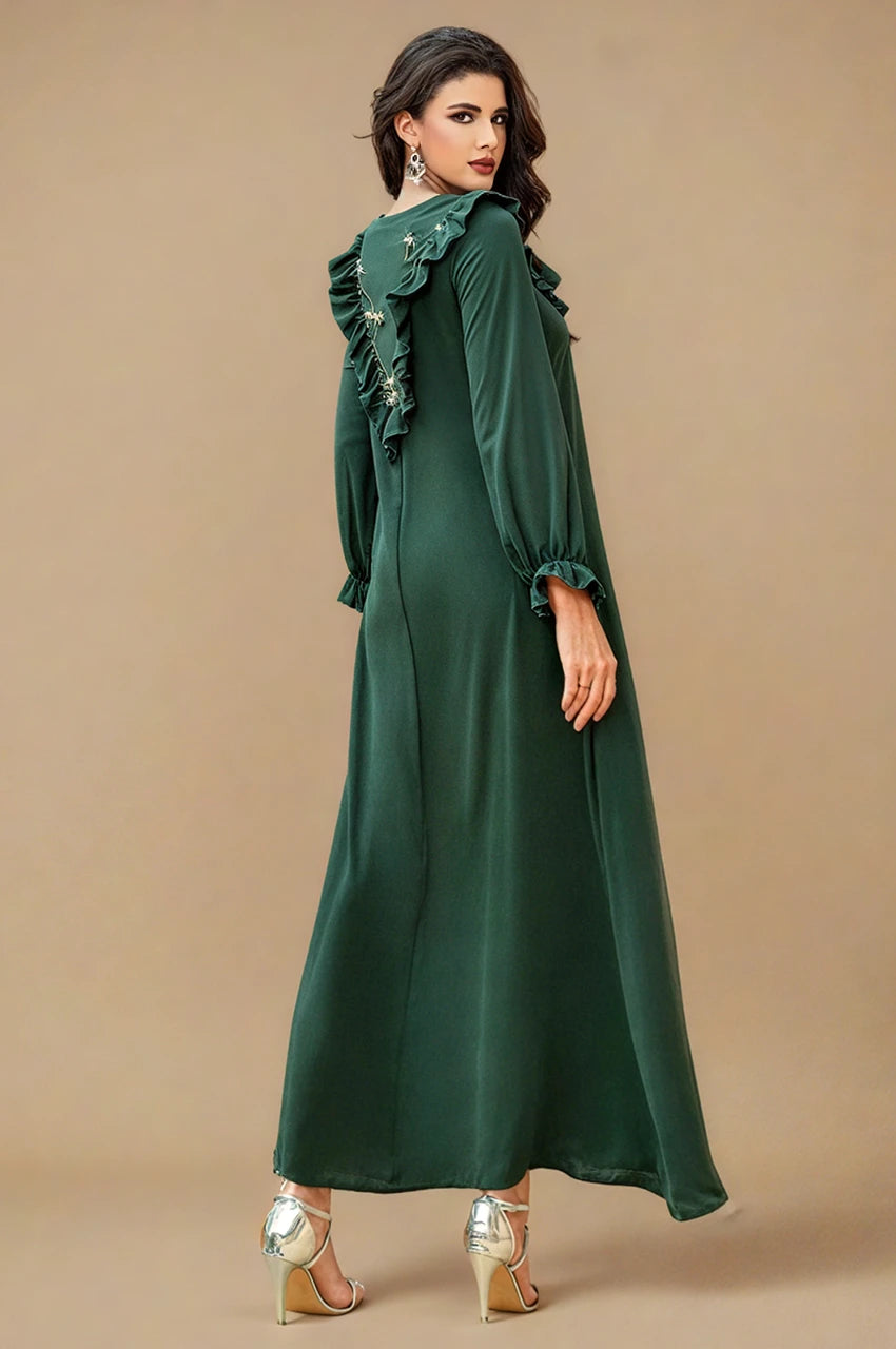 Back view angled of Kenza emerald maxi kaftan