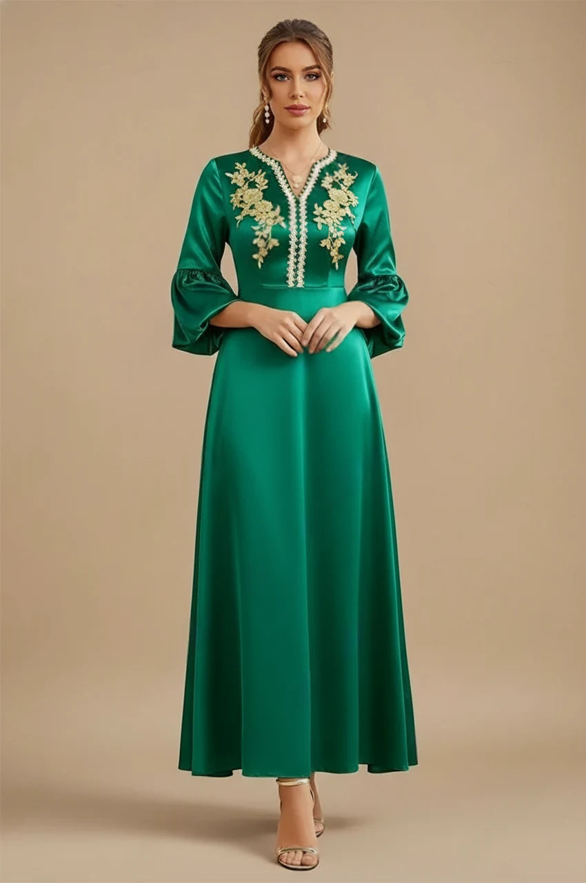 Kiara emerald green kaftan front view with gold embroidery and puff sleeves in satin fabric