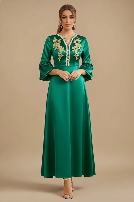Kiara emerald green kaftan front view with gold embroidery and puff sleeves in satin fabric