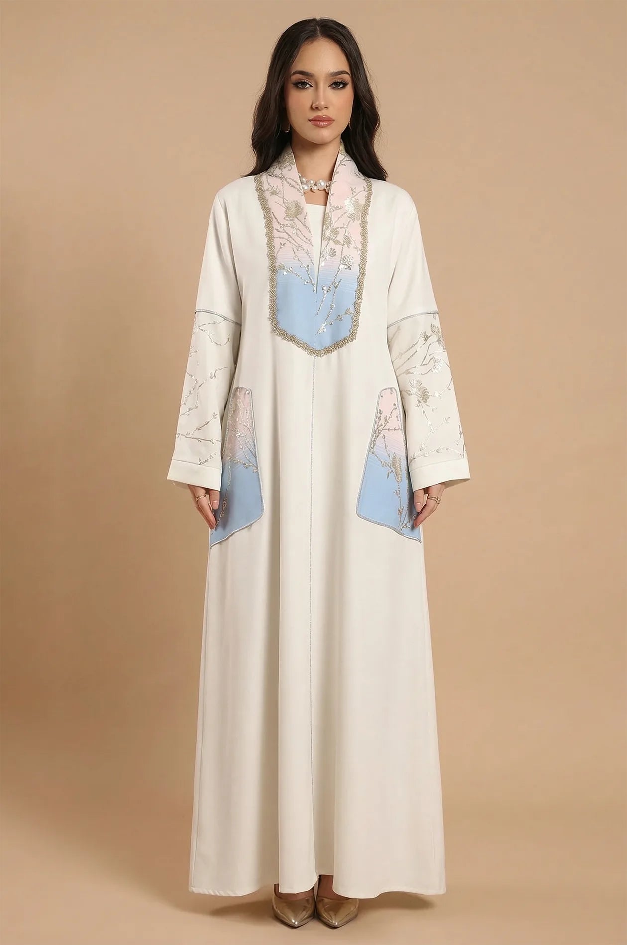 Professional studio portrait of the Liorra Light Blue Kaftan Ombre by Naylara, emphasizing its high-quality fabric and modest design.