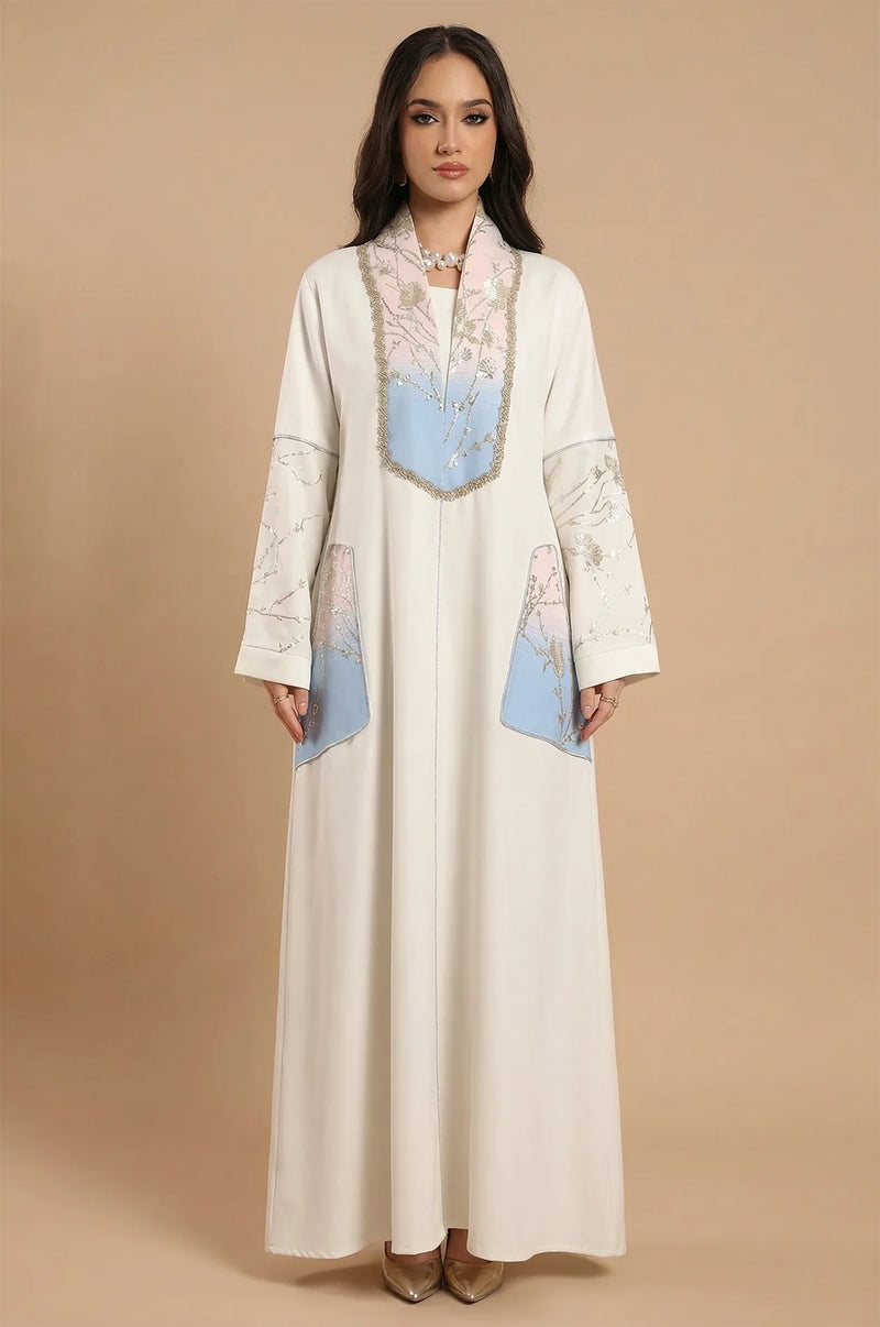 Professional studio portrait of the Liorra Light Blue Kaftan Ombre by Naylara, emphasizing its high-quality fabric and modest design.