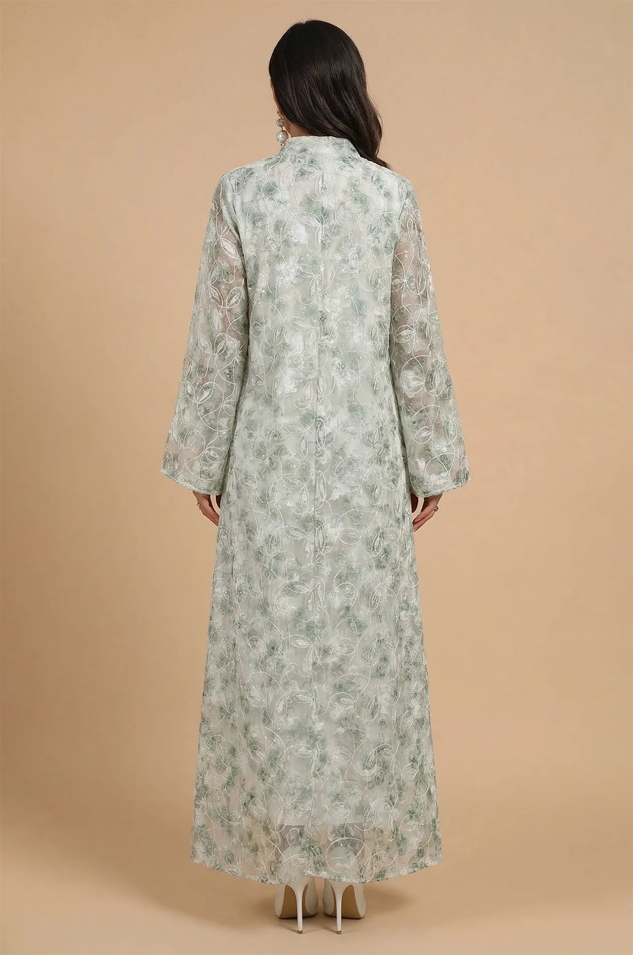 Back view showing the seamless floral lace pattern of the Lyana kaftan.