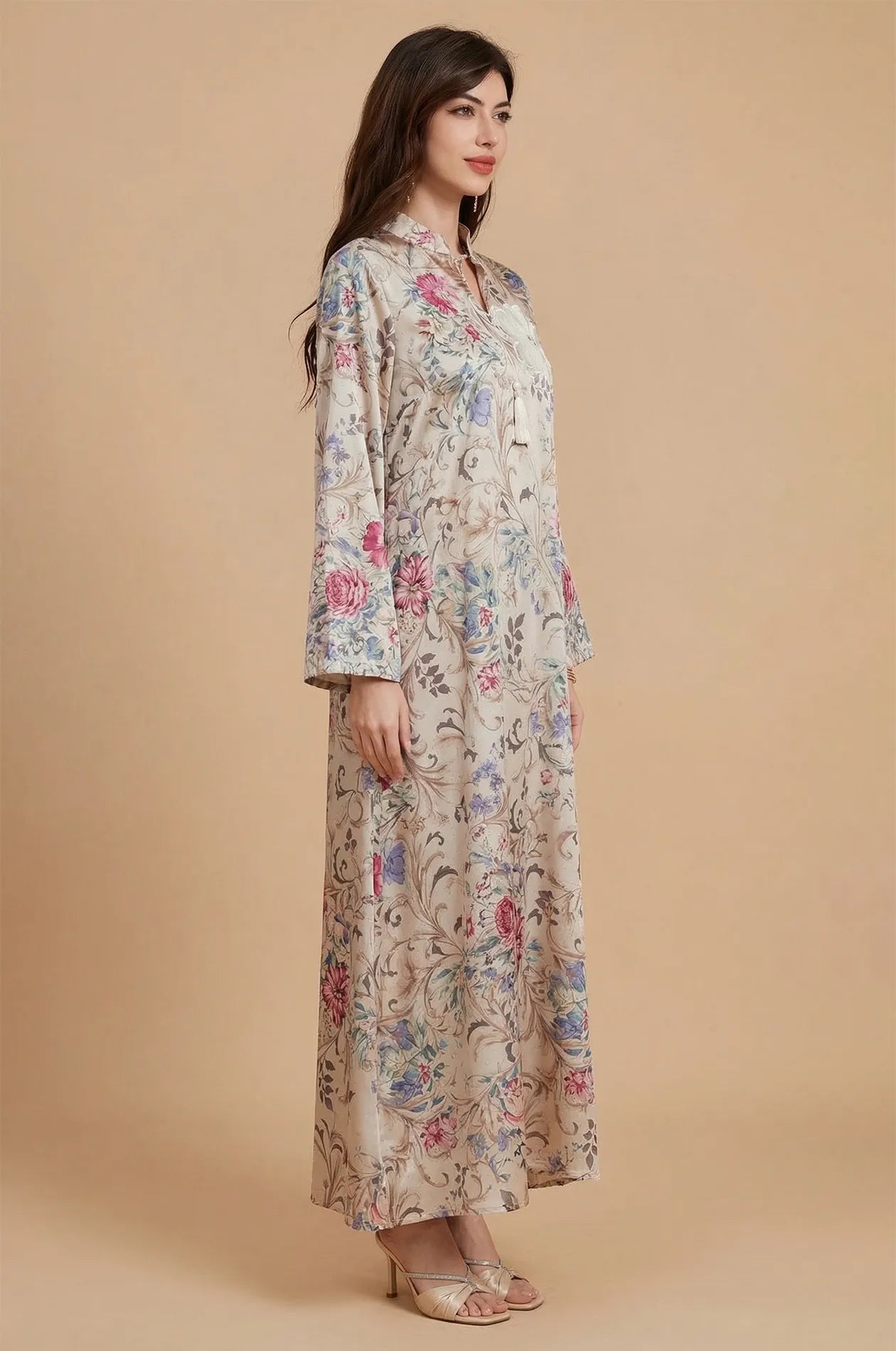 Side profile of the Lyris kaftan highlighting the fluid satin drape and sleeve length.