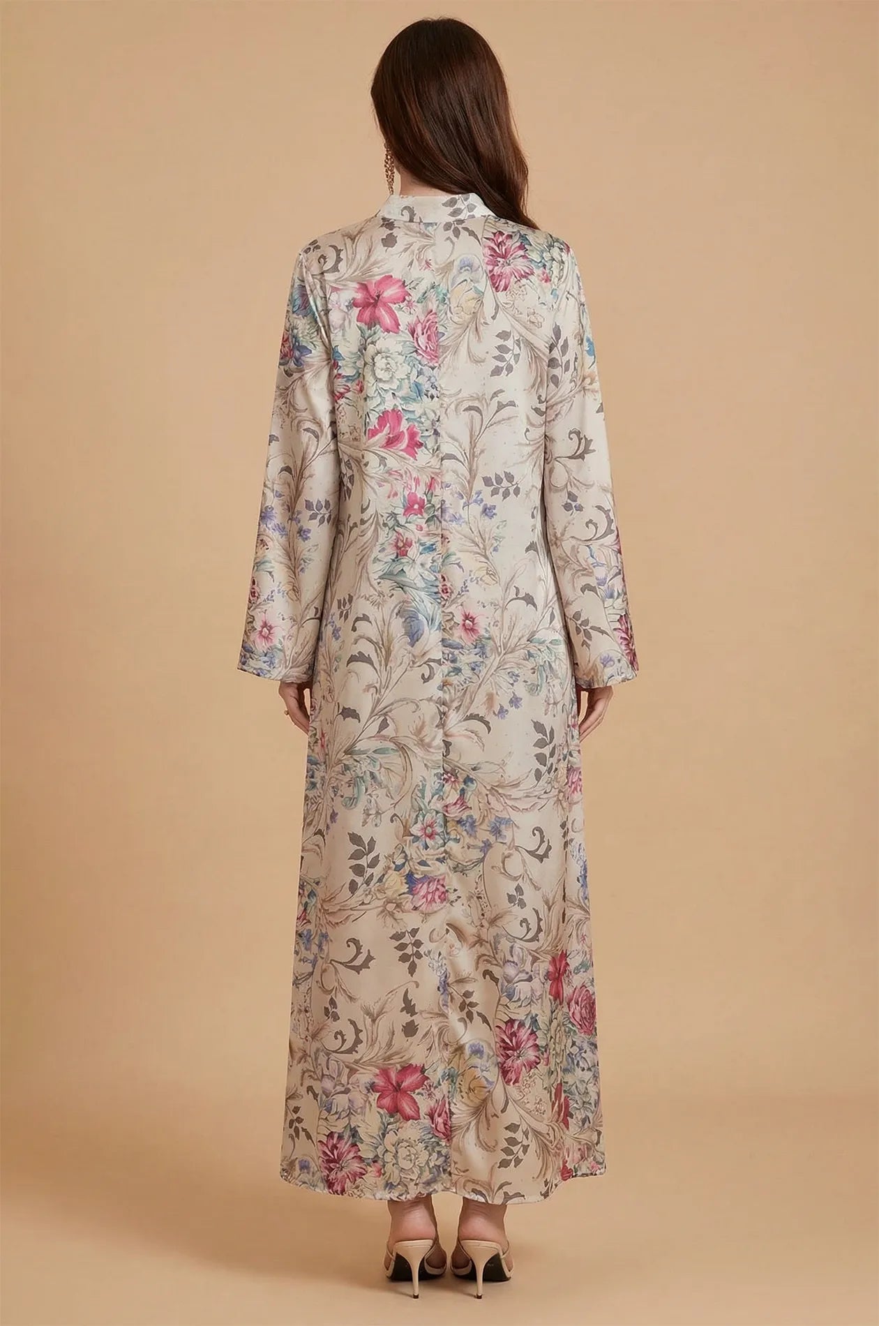 Back view of the Lyris floral satin maxi dress showcasing the seamless print design.