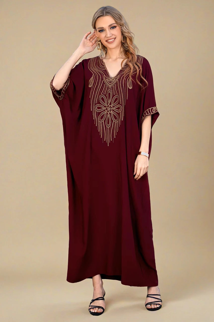 Detailed front view of Maela Chocolate Kaftan gold embellished design