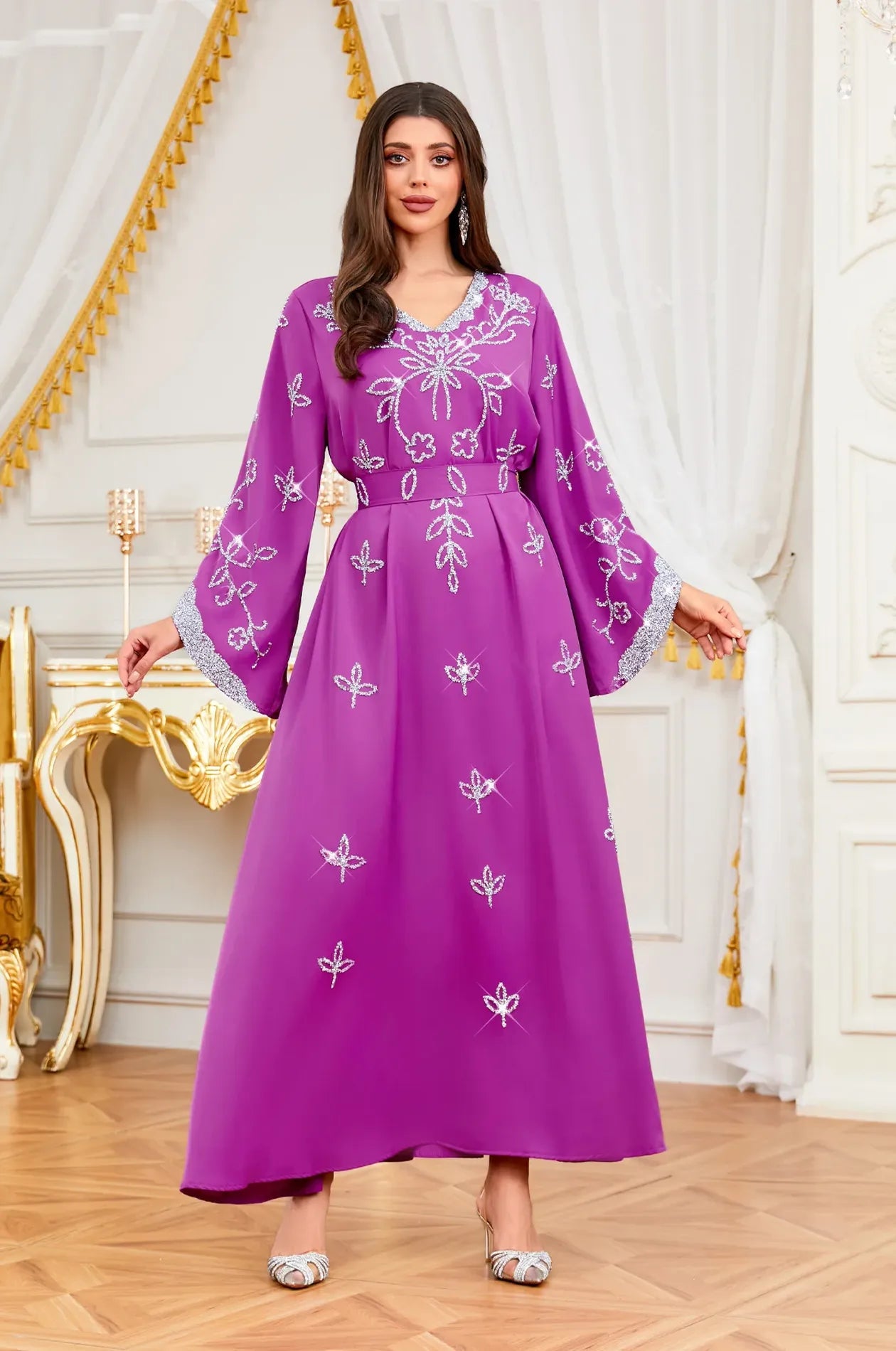 A stunning Magenta Maya Kaftan, the perfect choice for a wedding guest or high-end formal party.