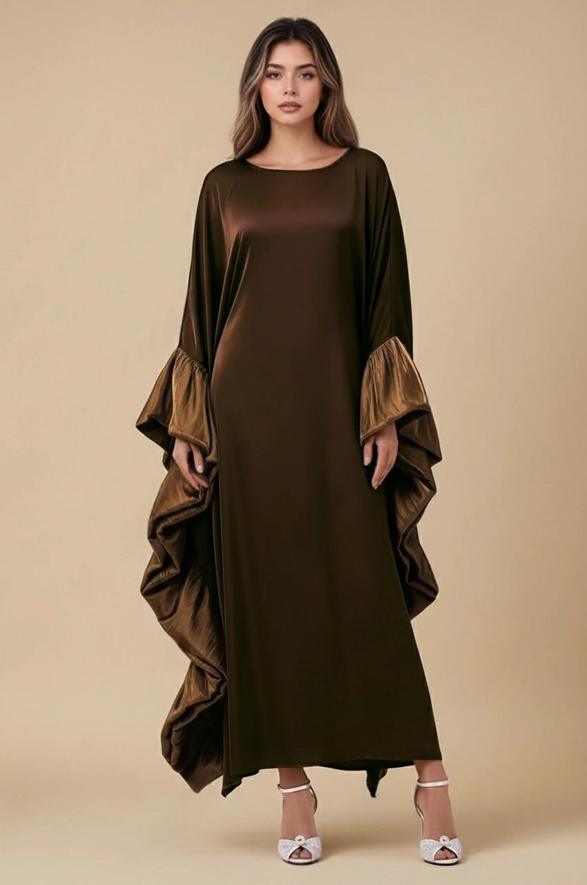 Studio front shot of the Malya brown ruffle kaftan with glossy satin drape