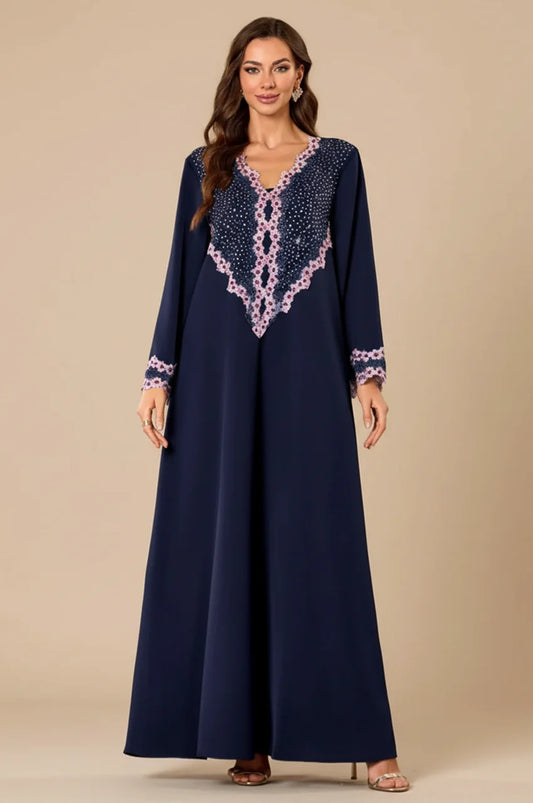 Full length view of the Milah navy blue evening kaftan.