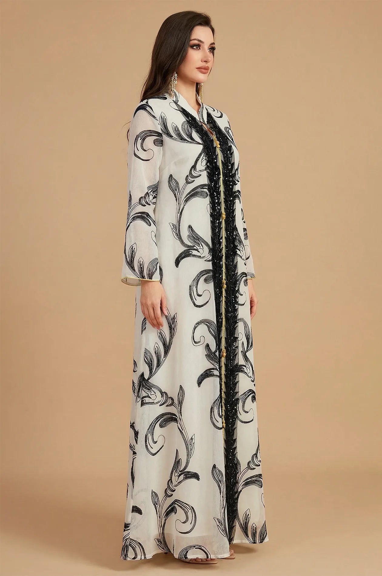 Side profile of the Mylah white kaftan highlighting the sleeve drape.