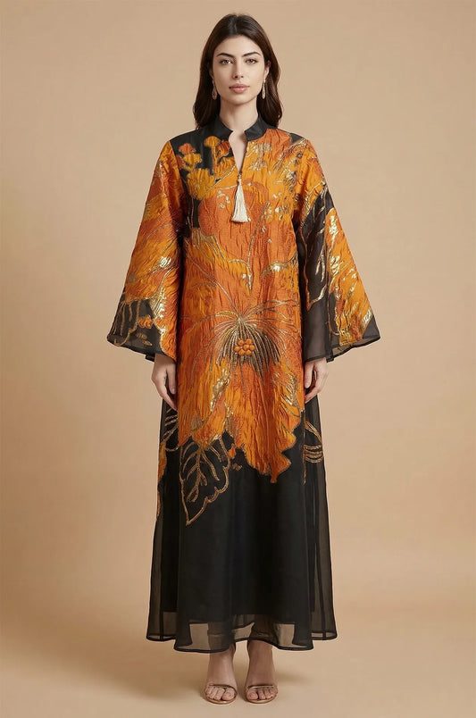 Frontal studio portrait of the Naeli Orange Flowy Kaftan with oversized floral motifs and a refined Mandarin collar.