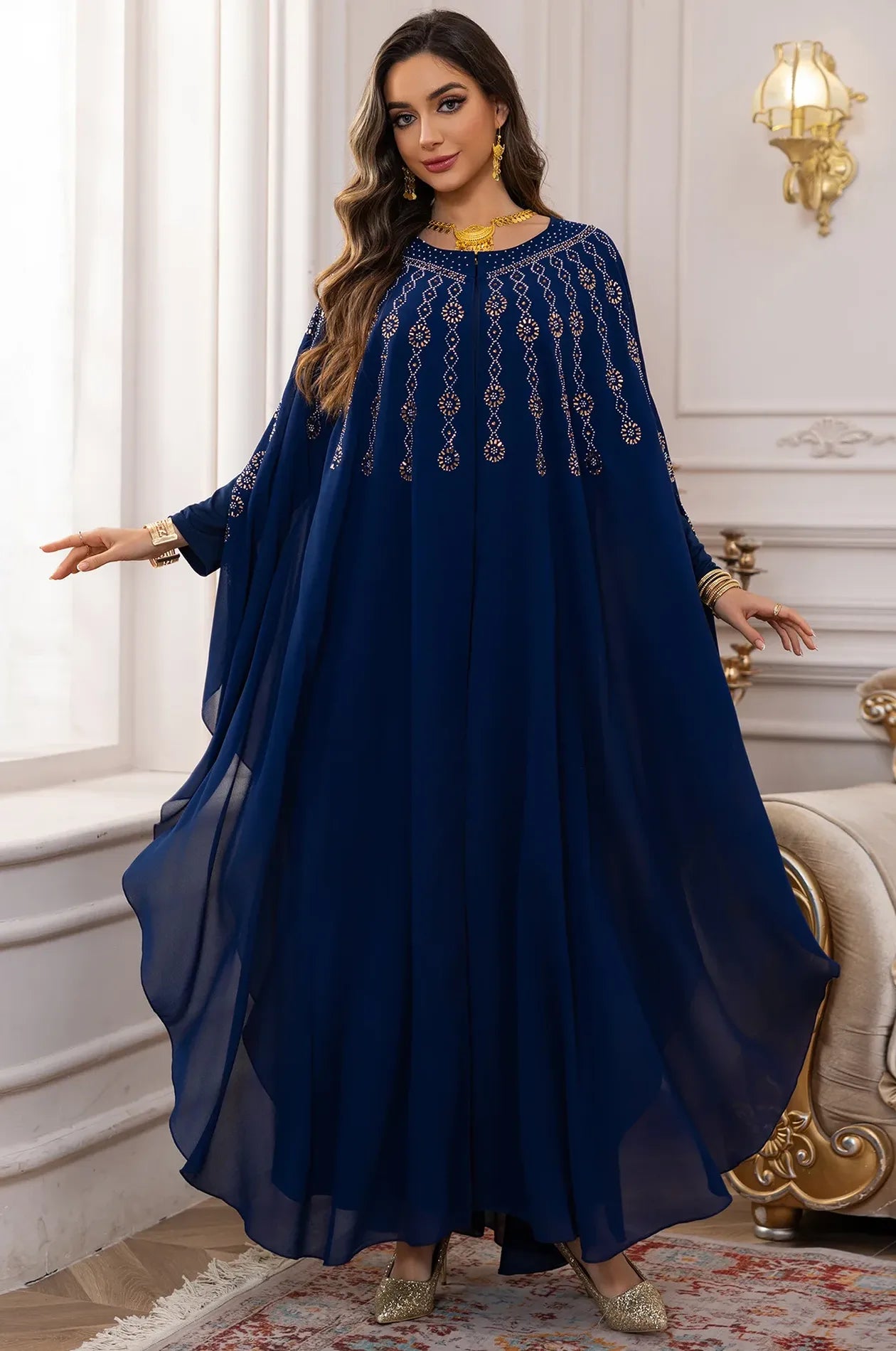 Wide shot showing the majestic butterfly wing spread and fluid drape of the Navy Blue Cassia Rhinestone Kaftan.