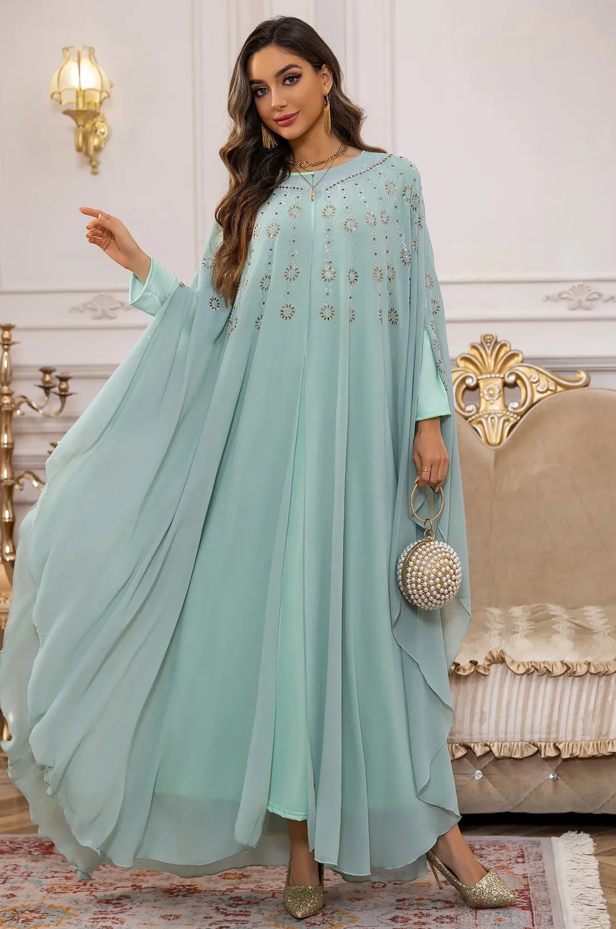 Elegant full-length shot showcasing the lightweight chiffon and rhinestone detail of the Light Green Cassia.