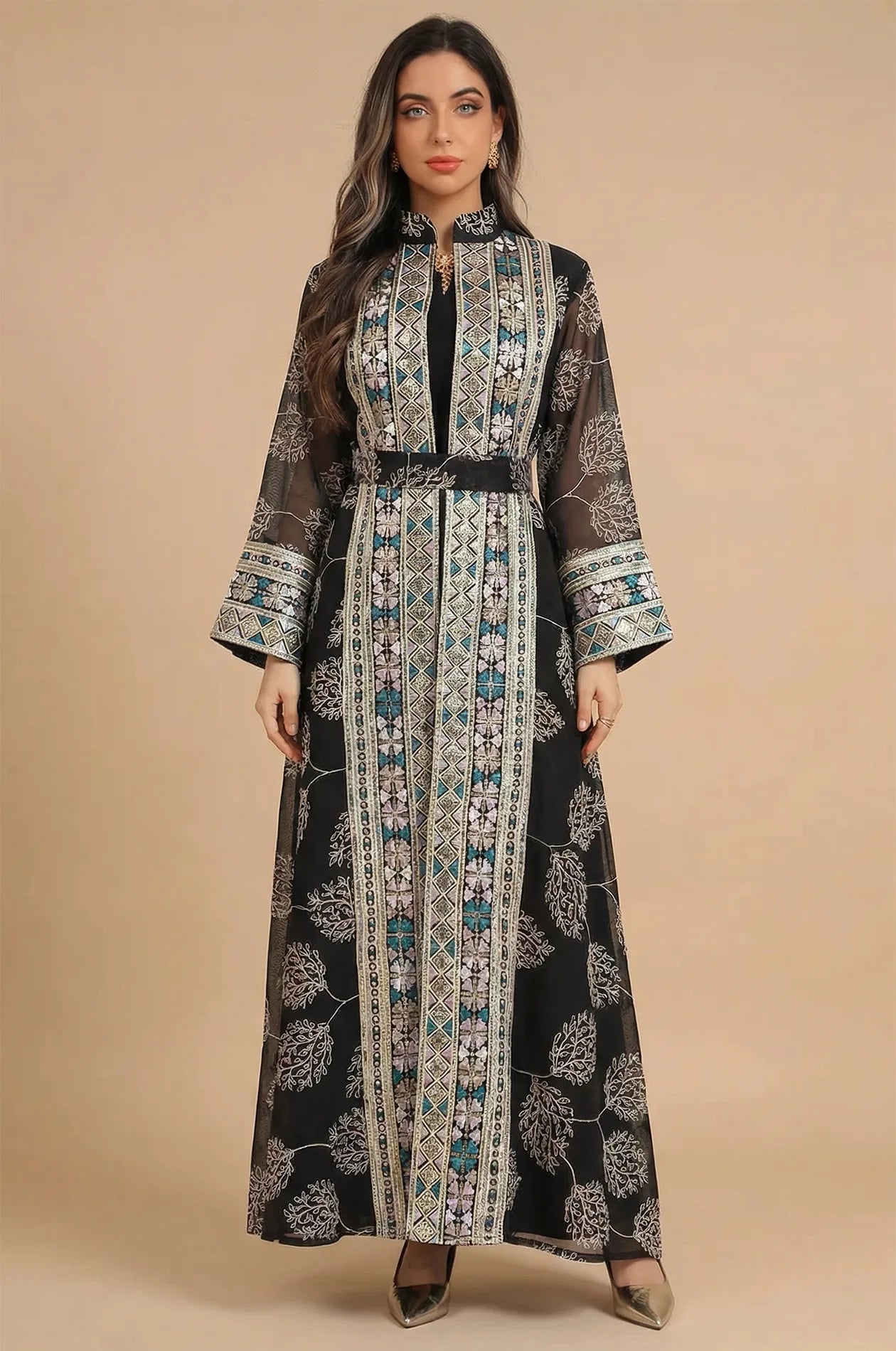 Studio front view of the Gienah black chic kaftan, showcasing the symmetrical embroidery and Mandarin collar design.