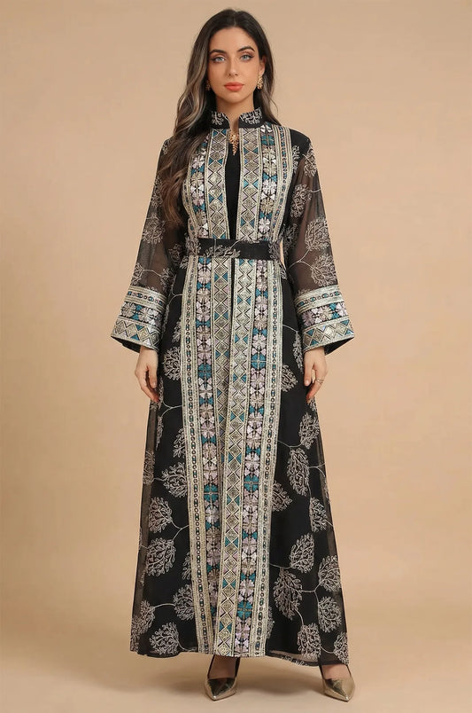 Studio front view of the Gienah black chic kaftan, showcasing the symmetrical embroidery and Mandarin collar design.