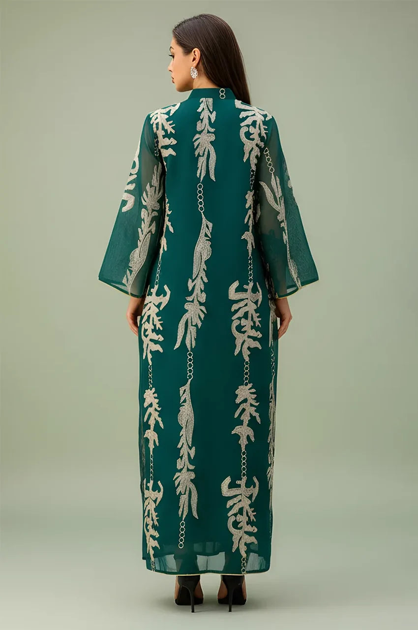 Full back view of the green Maliya flower kaftan illustrating the flowy silhouette and continuous floral embroidery patterns.