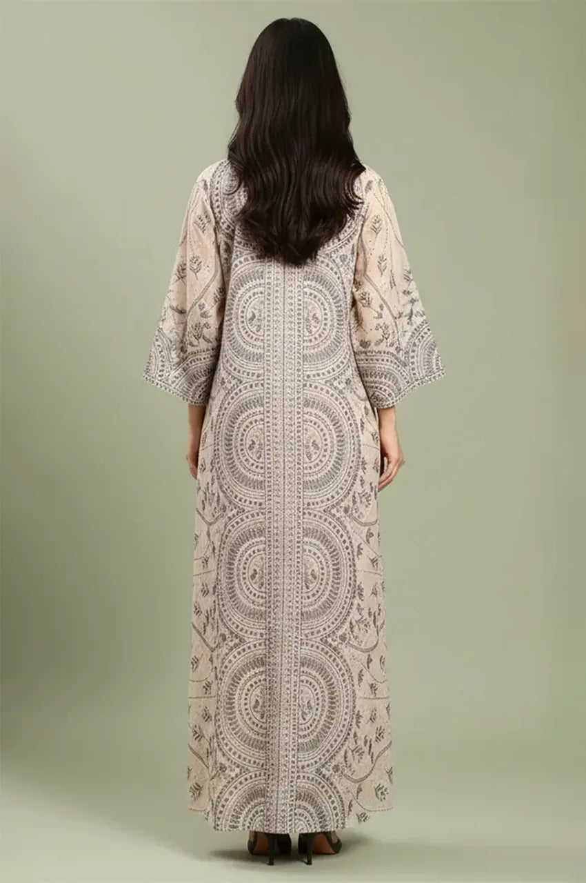 Rear view of the Kaly Beige sheer maxi kaftan highlighting the continuous Sfifa-inspired embroidery along the back panel.