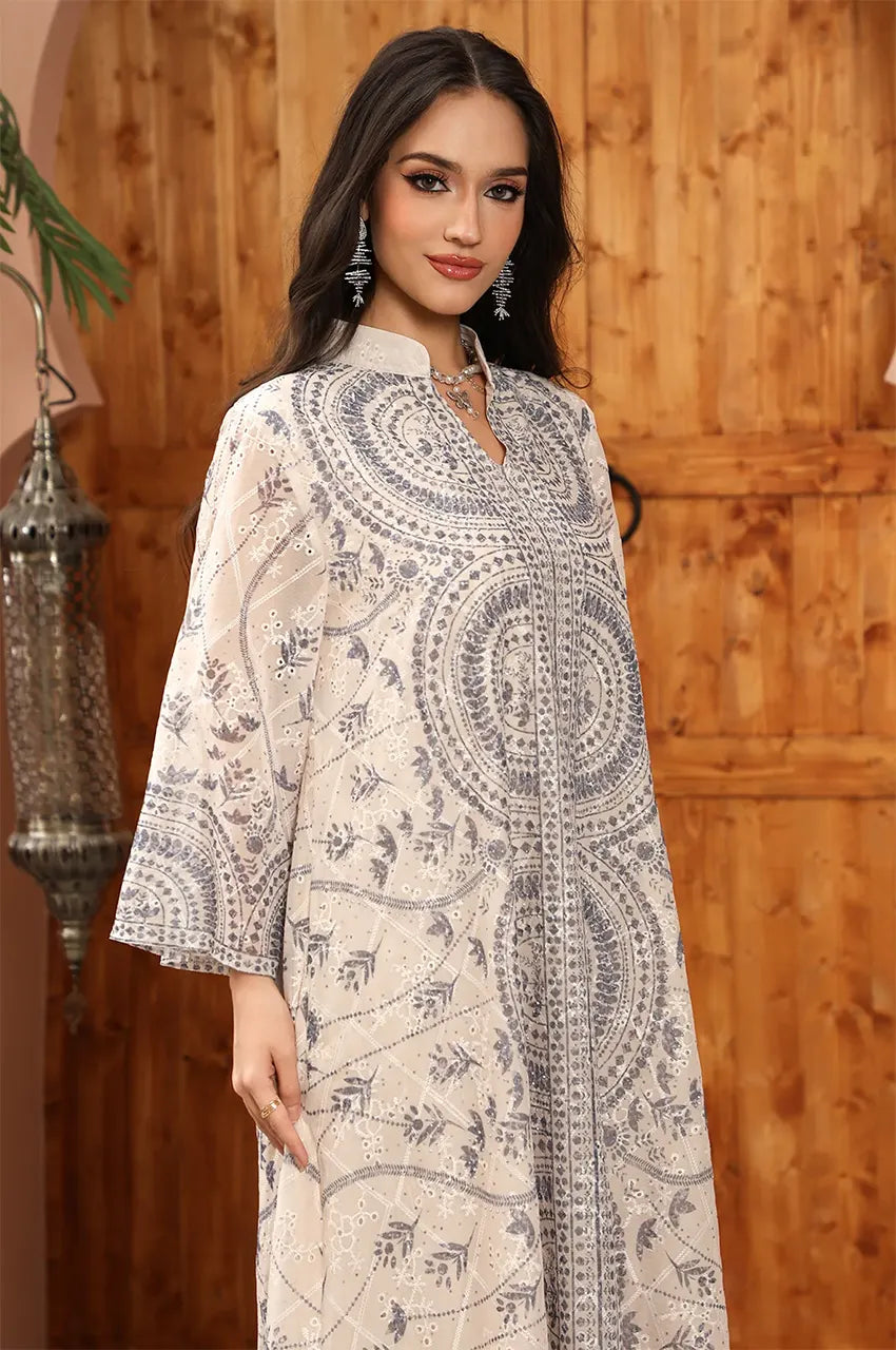 Detailed view of the Kaly Beige sheer maxi kaftan showing the texture of the sheer fabric and delicate tonal embroidery.