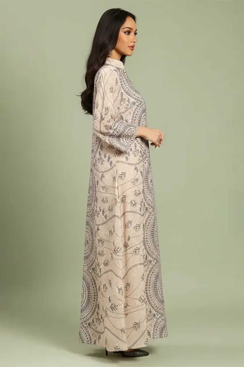 Side profile of the Kaly Beige sheer maxi kaftan demonstrating the airy georgette drape and wide flared sleeves.