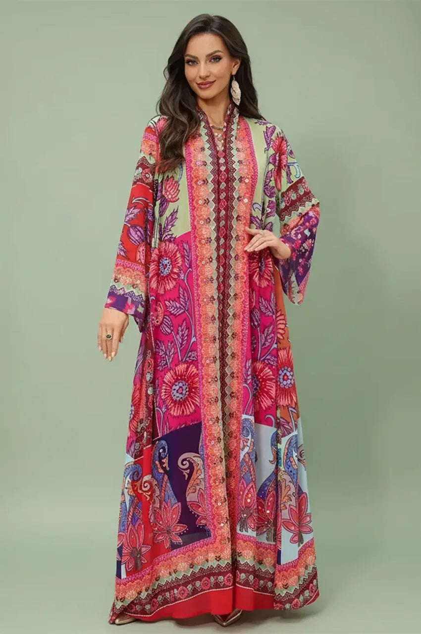 Full-length front view of the Kimia orange Indian kaftan night dress by Naylara, featuring traditional ornamental paisley and geometric patterns