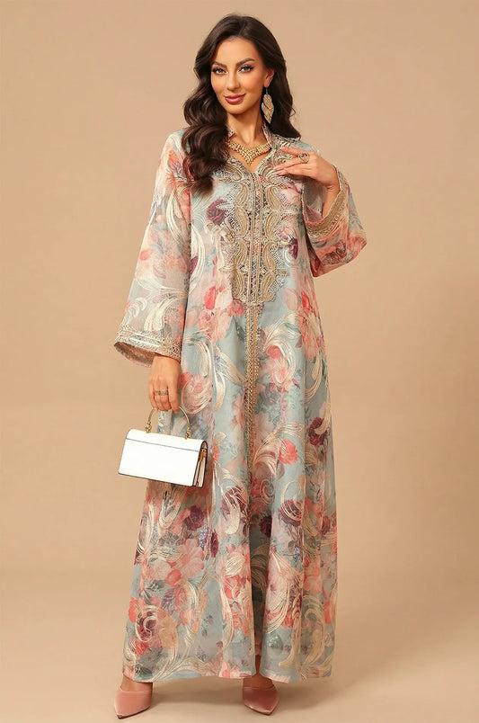 Full-length frontal view of the Naylara Lyrae green vintage embroidered kaftan featuring a floral print and white handbag.