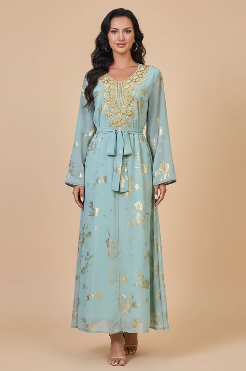 Full body studio shot of the Naylara Malika Aqua Gold moroccan kaftan with traditional gold embellishments.