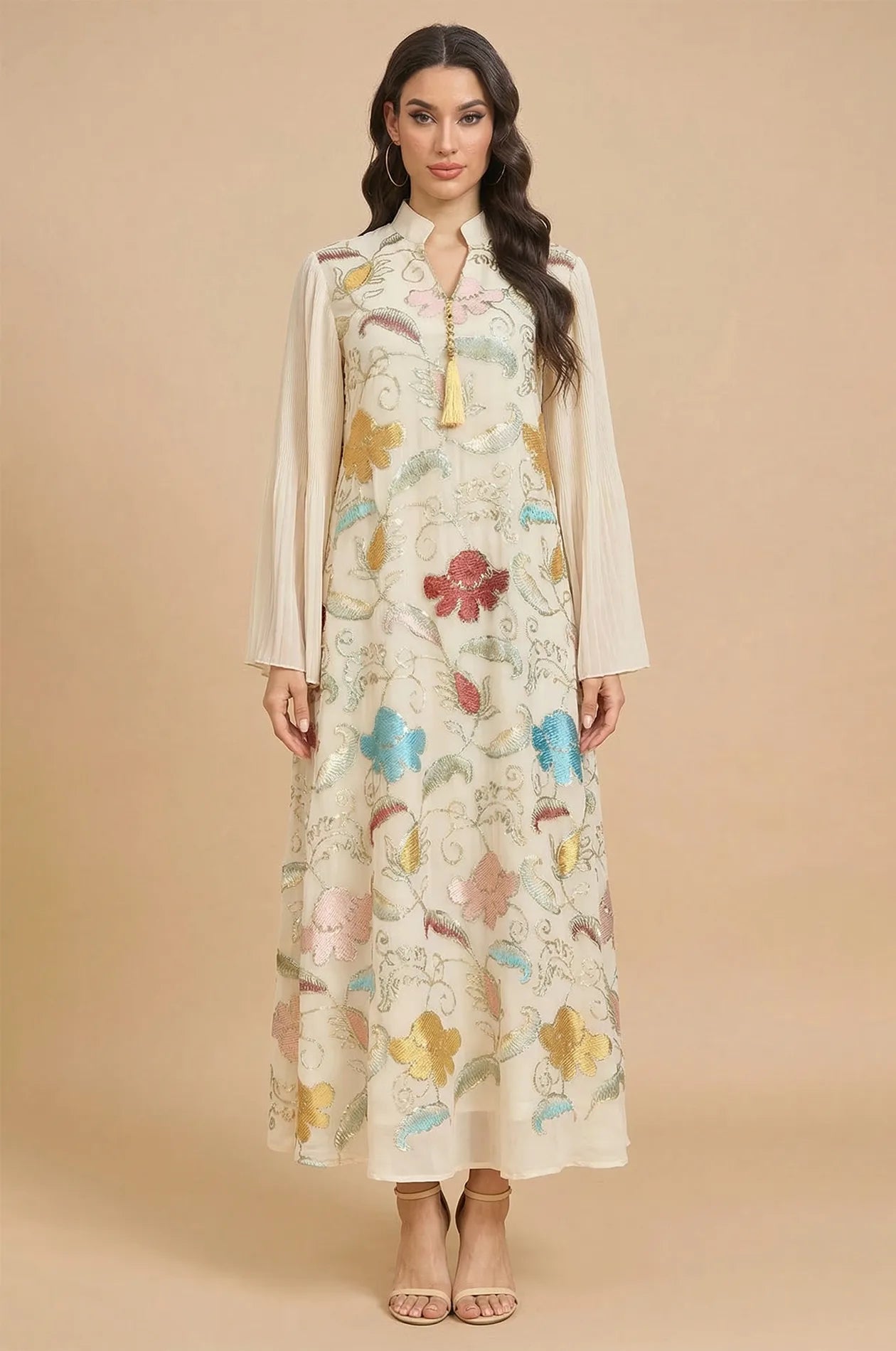 Professional studio full-length shot of the Marylin Beige Tassel Kaftan against a neutral background for product clarity.