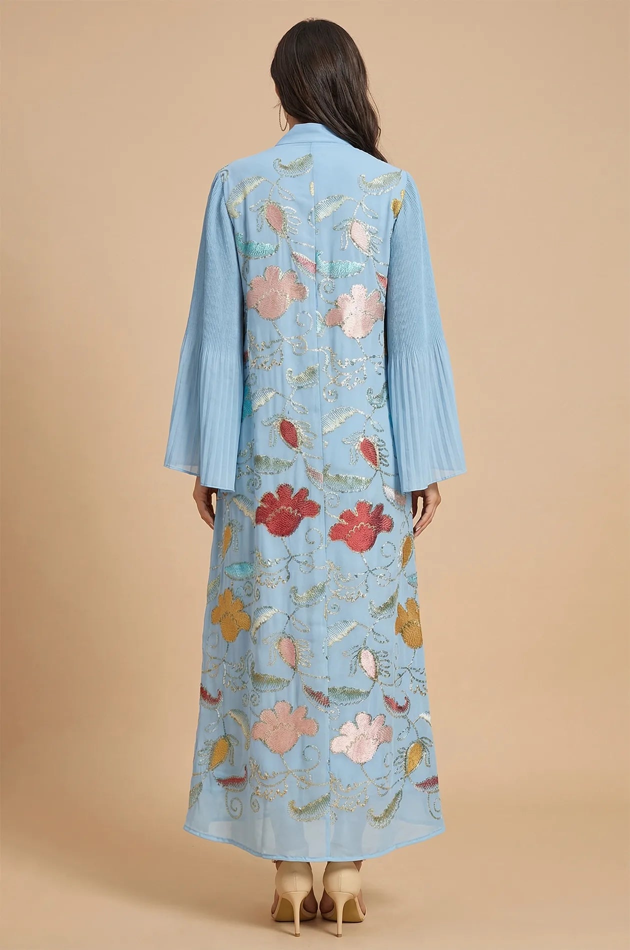 Full back view of the Marylin Light Blue Tassel Kaftan by Naylara, featuring extensive multicolored floral sequin embroidery.