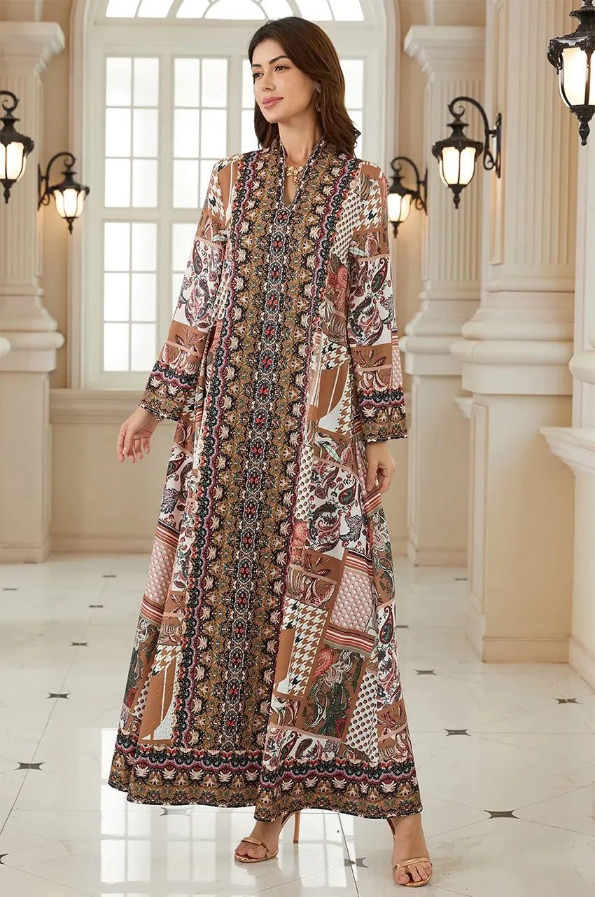 Model posing in the Nalah floor-length green block print kaftan.