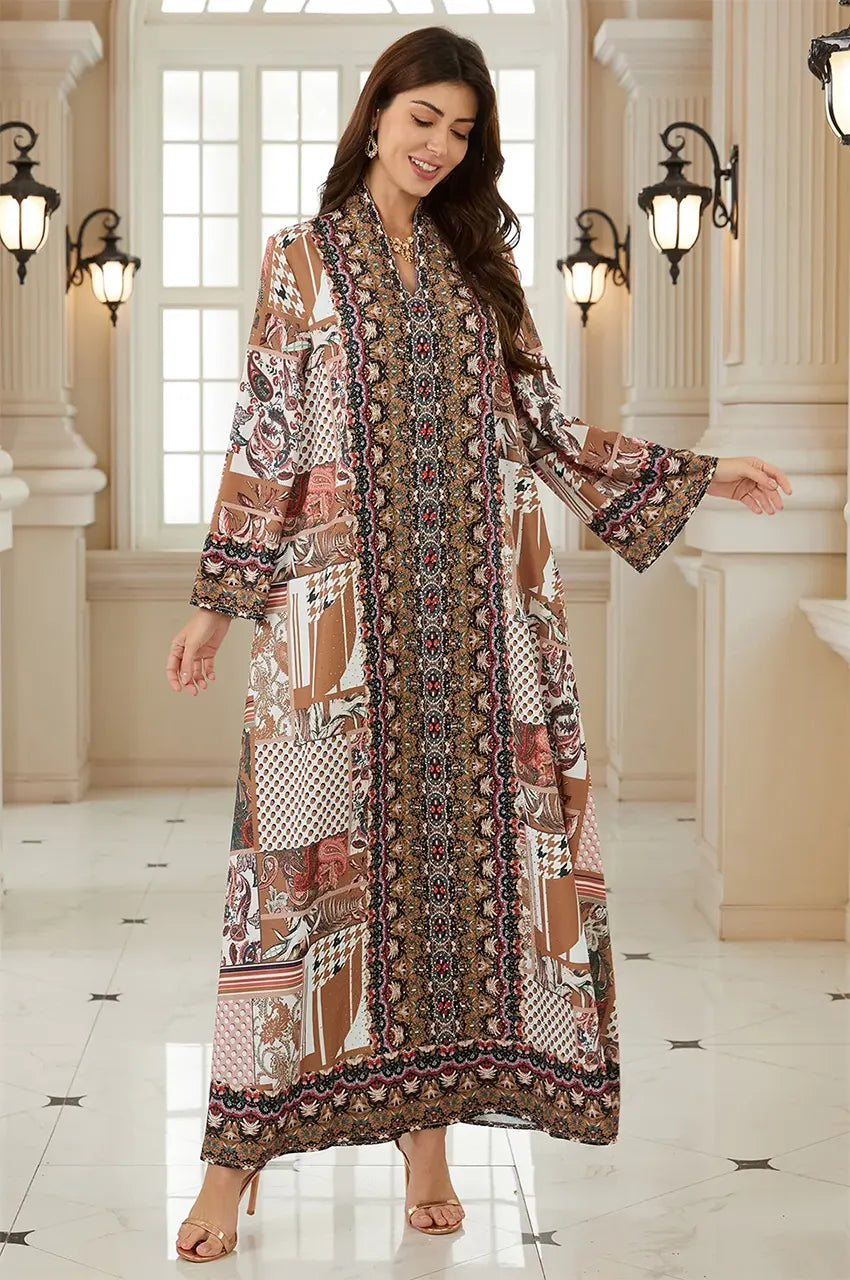 The Nalah green kaftan worn in a luxurious interior setting.