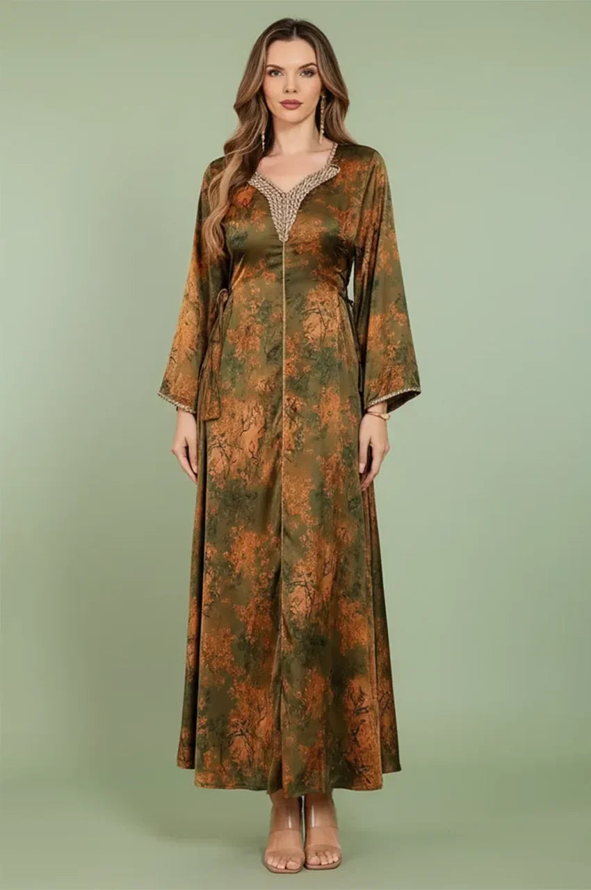 Full front view of the Noria olive green fitted kaftan featuring earthy tones, gold floral patterns, and traditional Sfifa braiding.